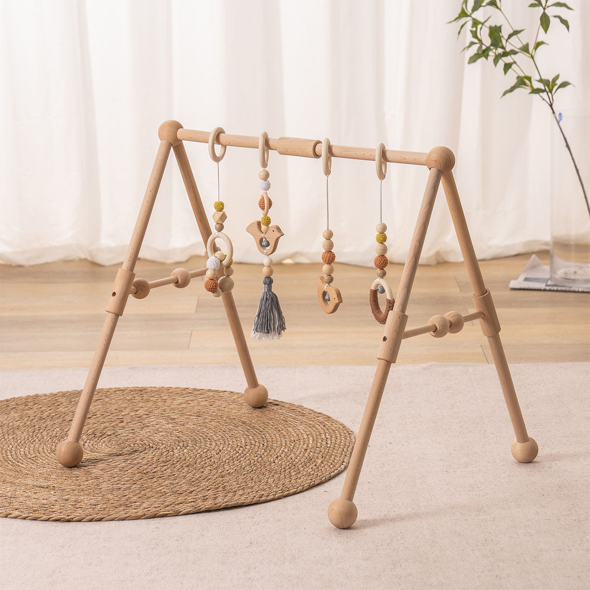 Portique bébé en bois ROBUD avec 4 jouets 